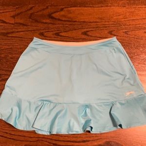Turquois skort size med., never worn.